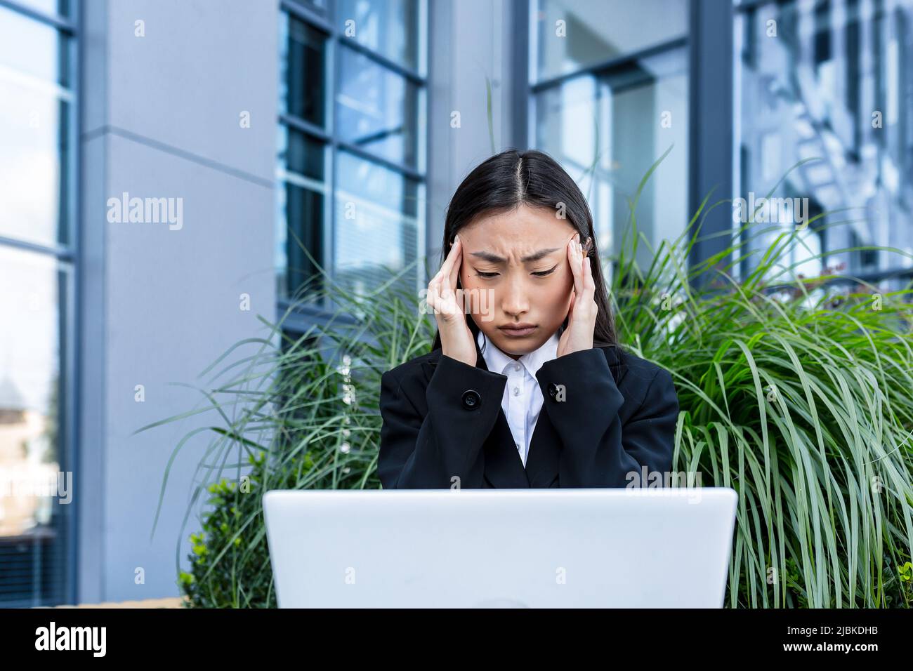 Sad student sitting on bench hi-res stock photography and images - Alamy