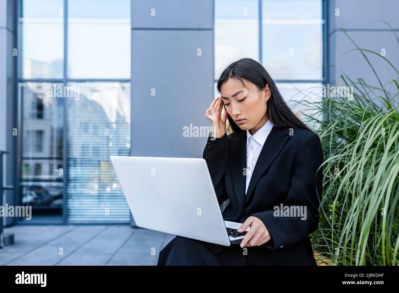 Sad student sitting on bench hi-res stock photography and images - Alamy