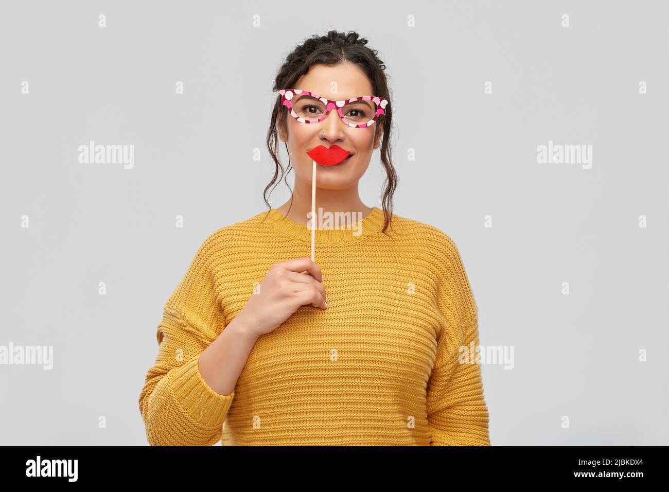 happy young woman with big glasses and lips Stock Photo