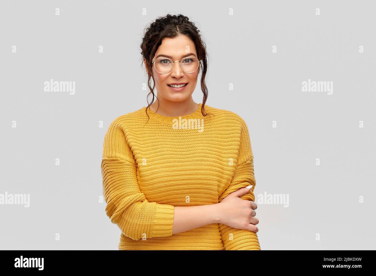 happy smiling young woman in glasses Stock Photo