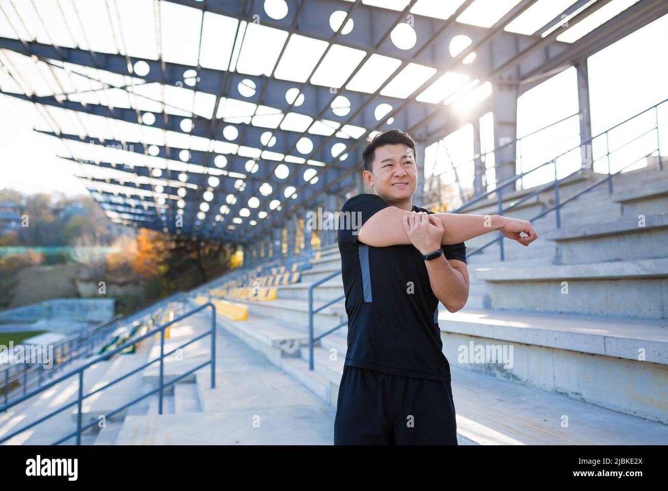 The athlete was injured, the Asian man has a shoulder pain after