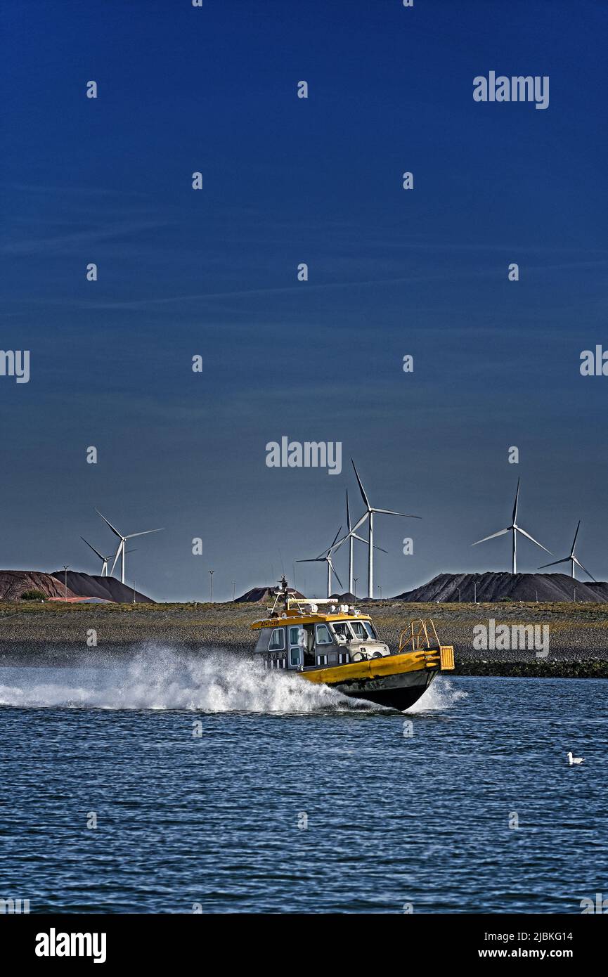 port of rotterdam ( maasvlakte ), netherlands - 2022-05-24:  boatmen association boat krve 59 speeding up calandkanaal near eecv --  [credit: joachim Stock Photo