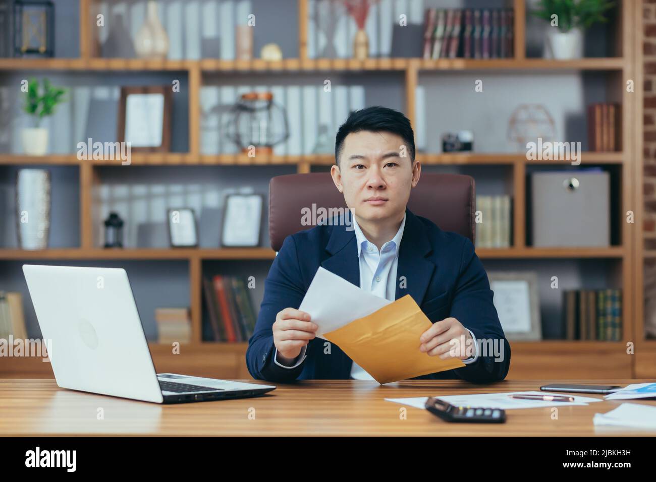 Young successful man asian office worker, director, banker, businessman