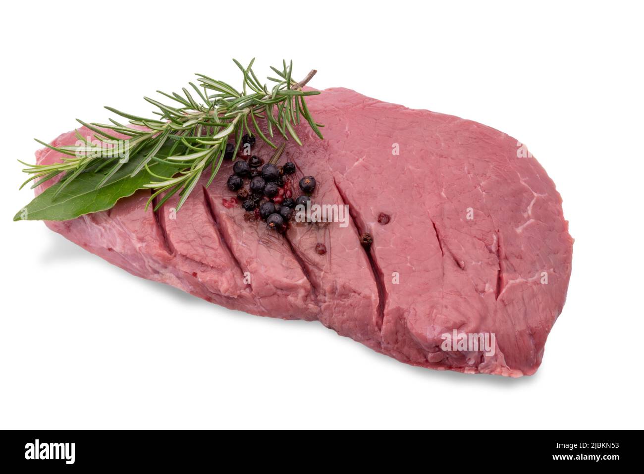 Beef steak with flavors, rosemary and bay leaf. Isolated on white