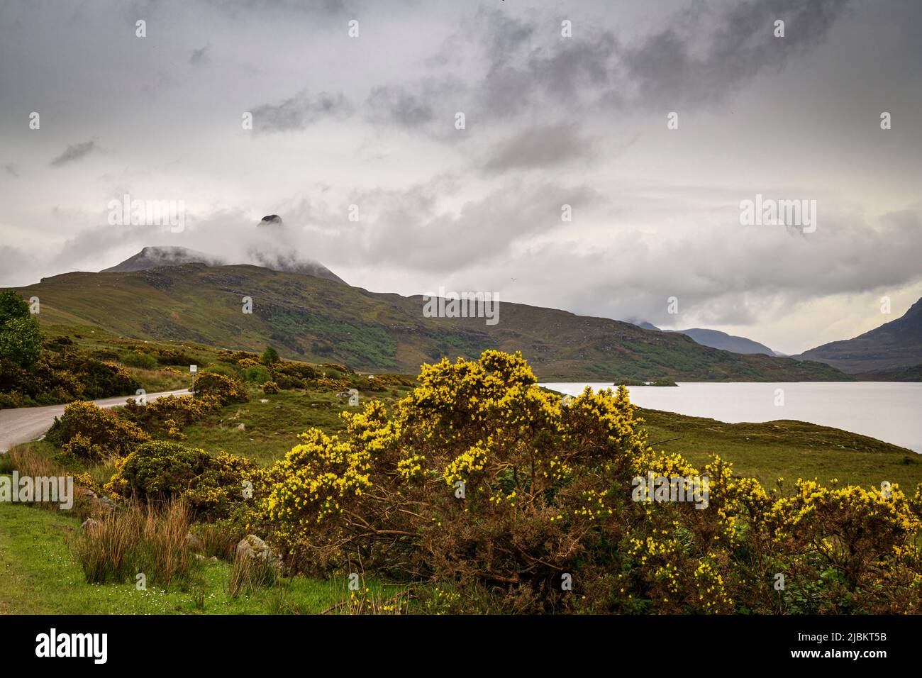 A dramatic, summer, low cloud, landscape HDR image of Stac Pollaidh in Sutherland, Scotland. 23 May 2022 Stock Photo
