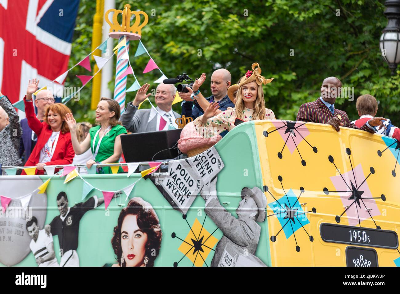Celebrities on open top bus at the Queen's Platinum Jubilee Pageant parade in The Mall, London, UK. Katherine Jenkins Stock Photo
