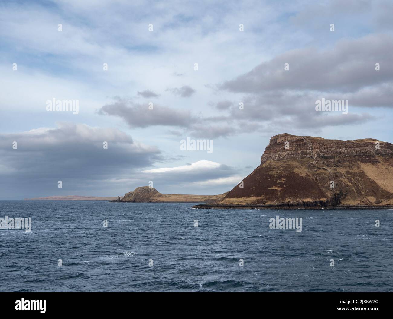 Ru Idrigill and Stack of Skudiburgh as seen from the Calmac ferry as it departs from Uig on the Isle of Skye, Scotland Stock Photo