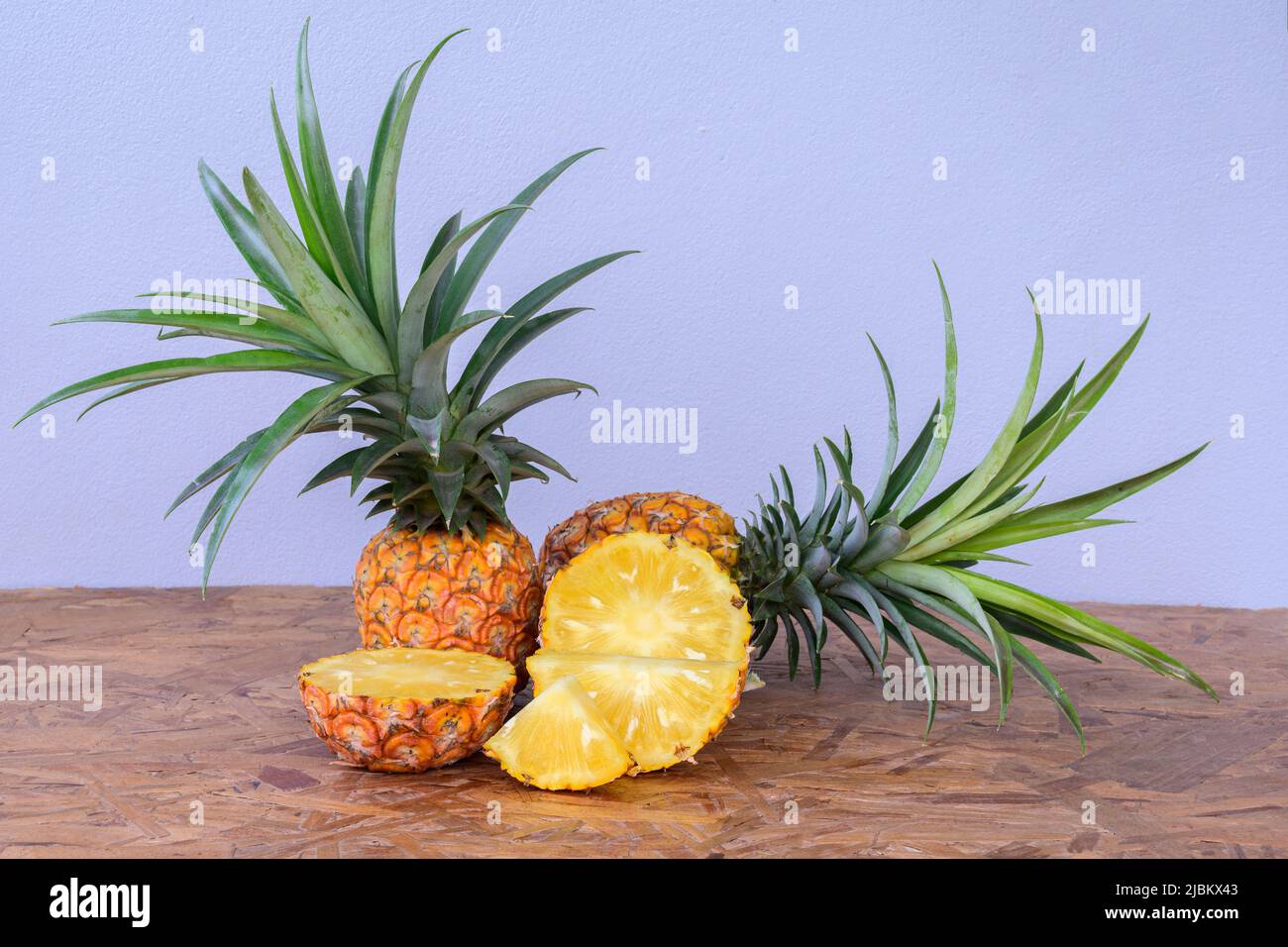 Fresh slice pineapple pieces on table. Closeup summer food and drink Stock Photo