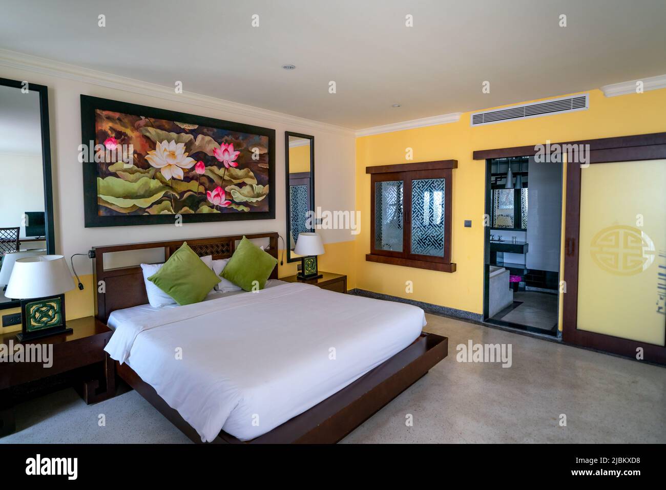 Hue City, Vietnam - April 26, 2022: The bedroom interior of the 4-star 'Hue Villa' hotel in Hue city, Vietnam Stock Photo