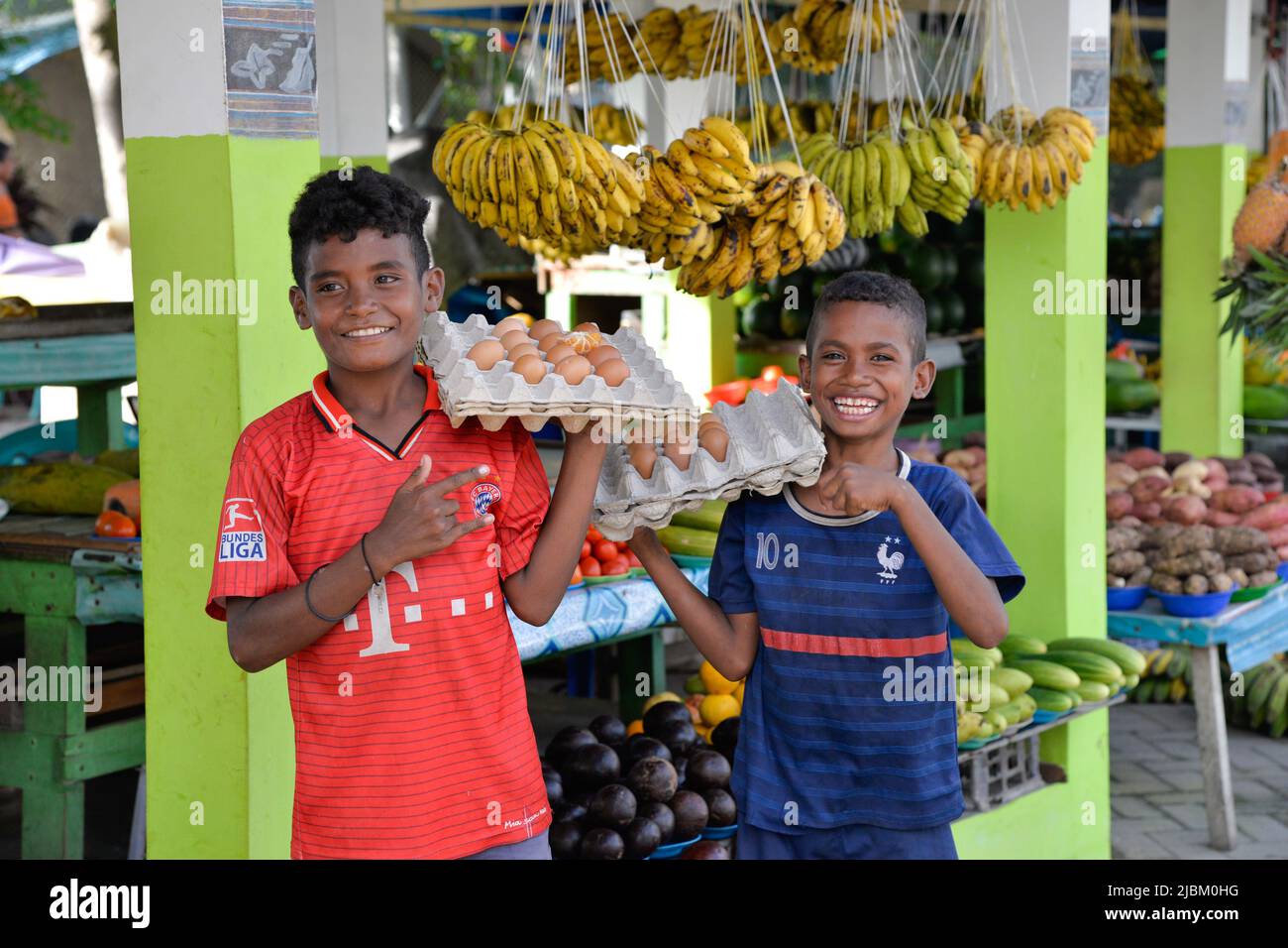 Dili, Timor-Leste. 6th June, 2022. Boys sell eggs at a fruit market in