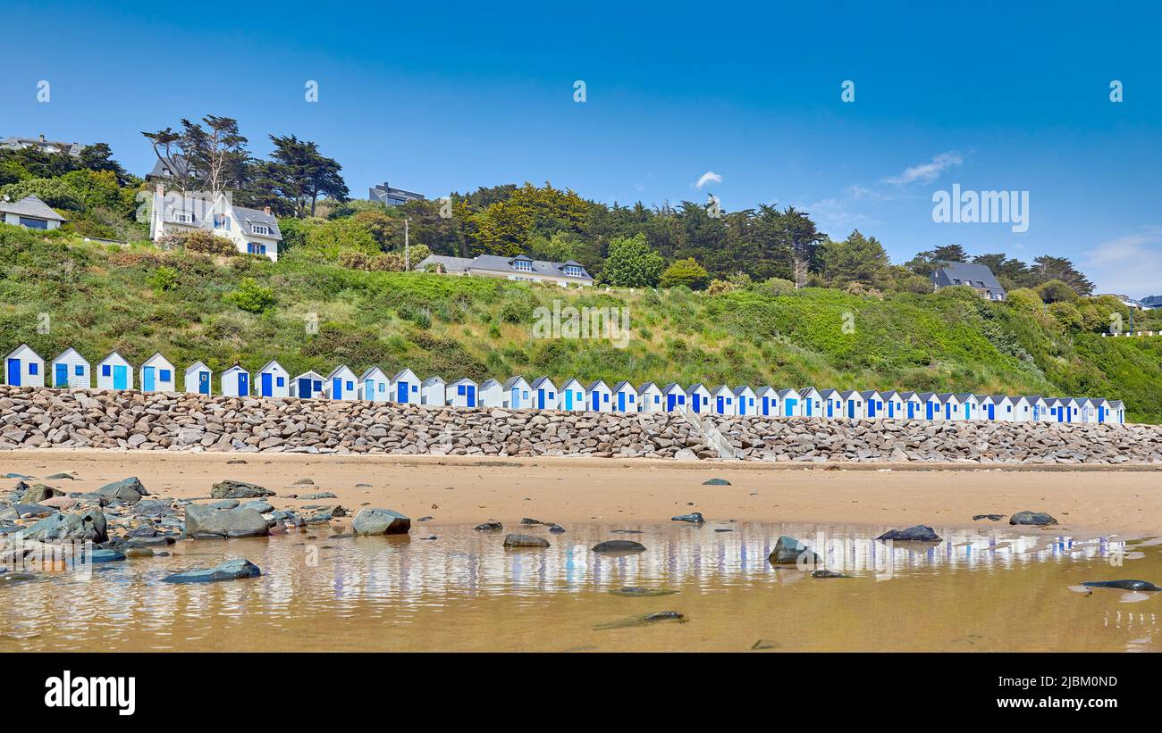 Plage de Cartret beach with seaside huts on a sunny day. in France Stock Photo