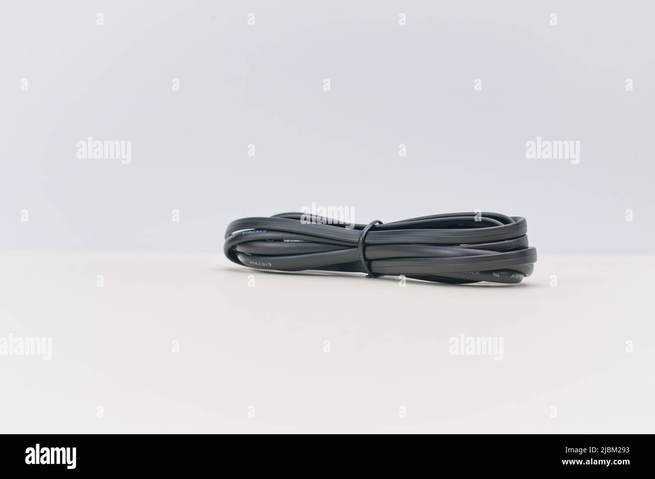 isolated data cable with RJ11 phone modem connector on a soft white desk Stock Photo Alamy