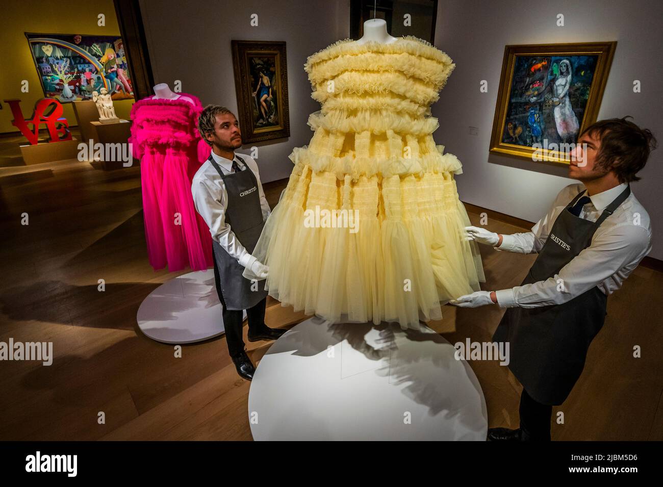 London UK. 7th June 2022. Two of Six dresses from British Fashion Designer Molly Goddard with other works The Art of Literature Exhibition with Fashion by Molly Goddard part of London