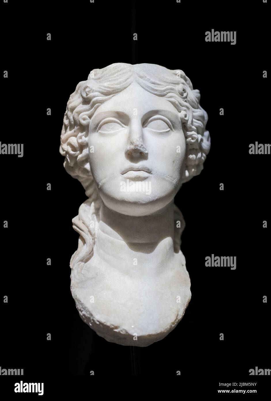 Statue of woman head isolated on black background Stock Photo Alamy