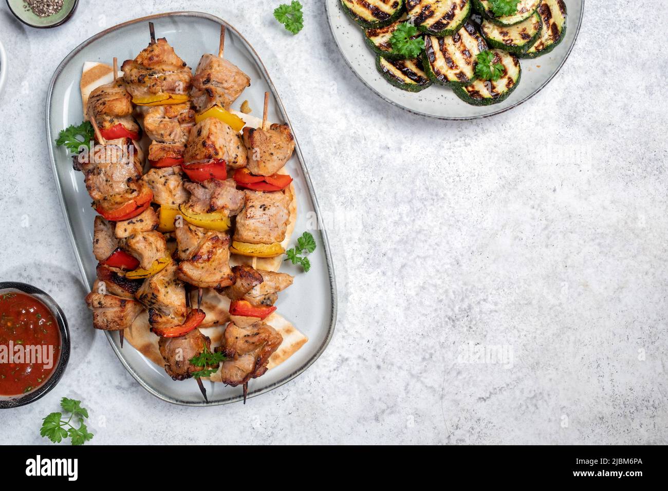 Grilled pork kebab with red and yellow pepper Stock Photo
