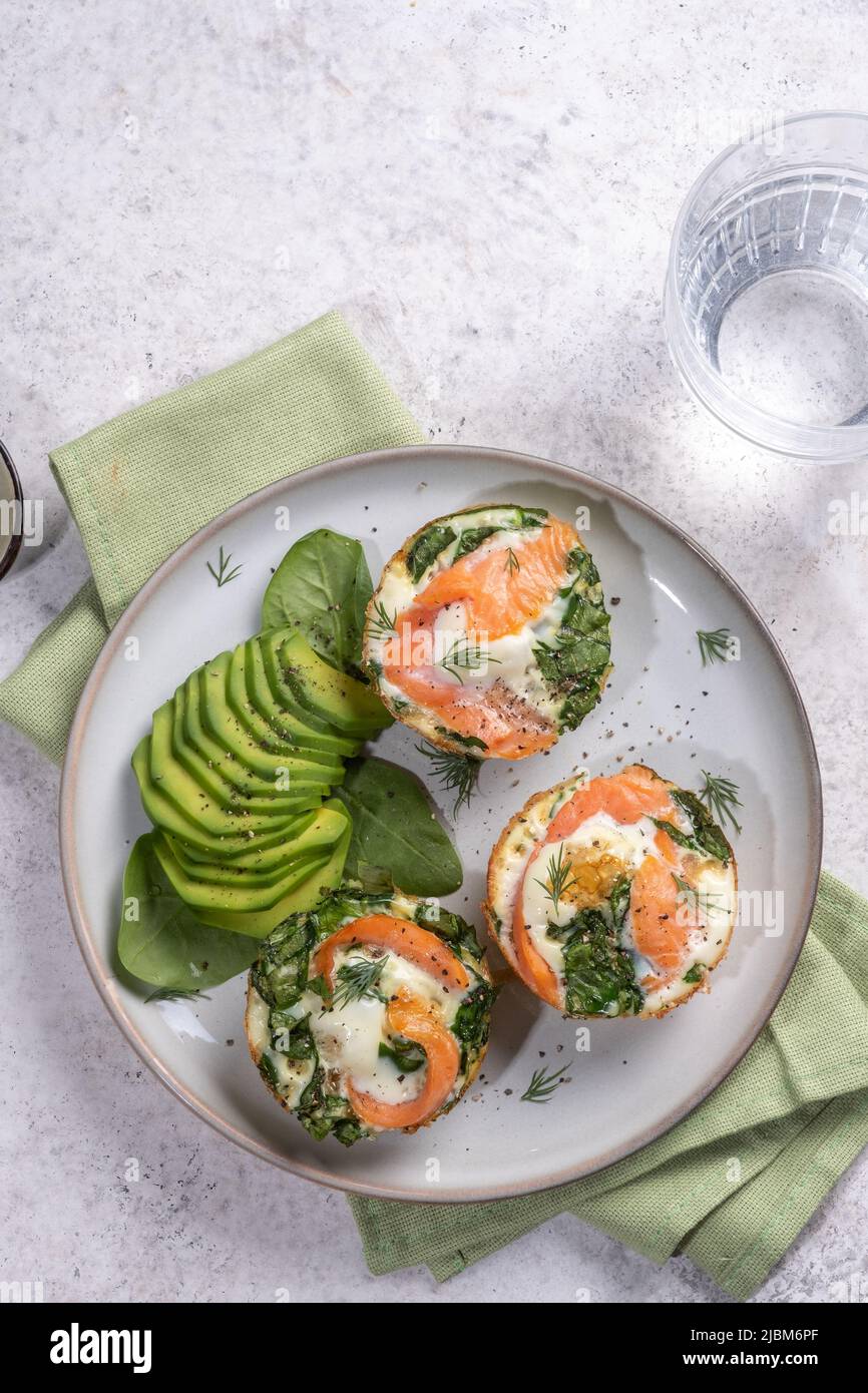 Egg white muffins with salmon, spinach and cheese Stock Photo