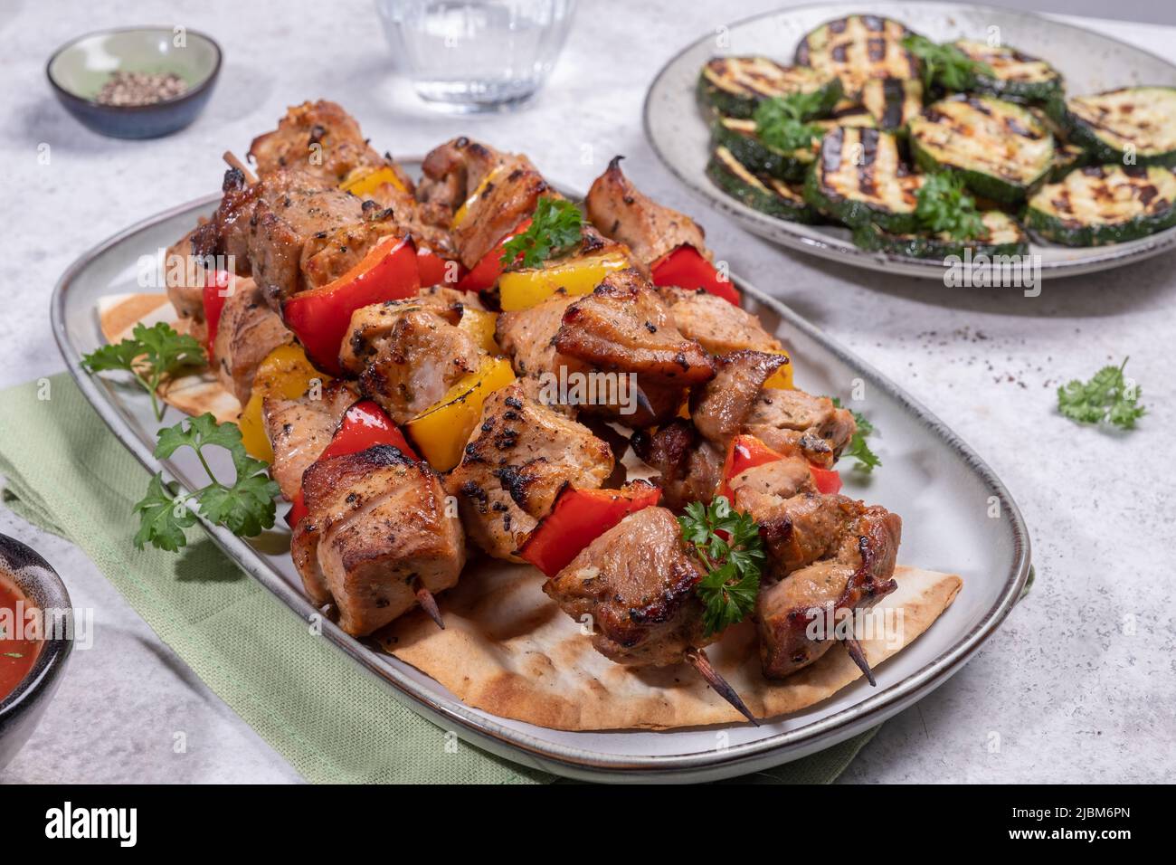 Grilled pork kebab with red and yellow pepper Stock Photo