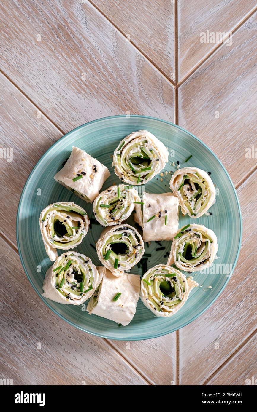 Cream cheese dill cucumber tortilla wrap Stock Photo Alamy