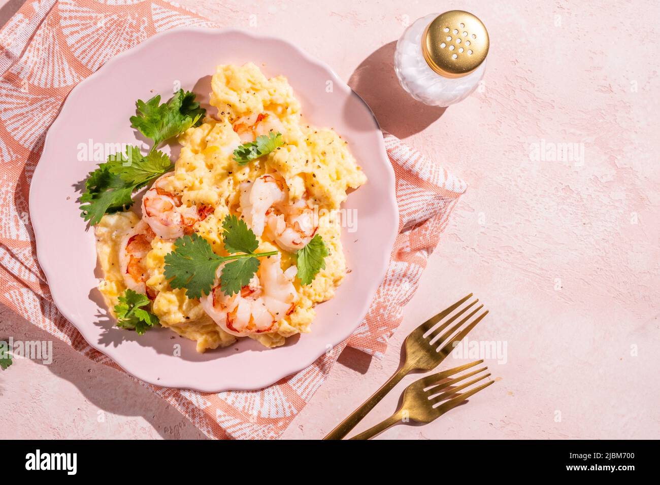 scrambled eggs with shrimp and cilanto for breakfast Stock Photo