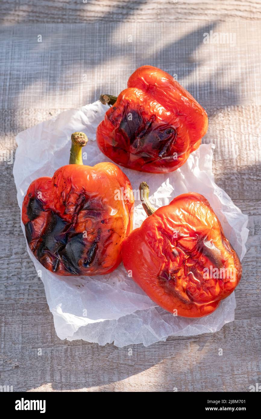 Roasted red peppers on the barbecue grill Stock Photo