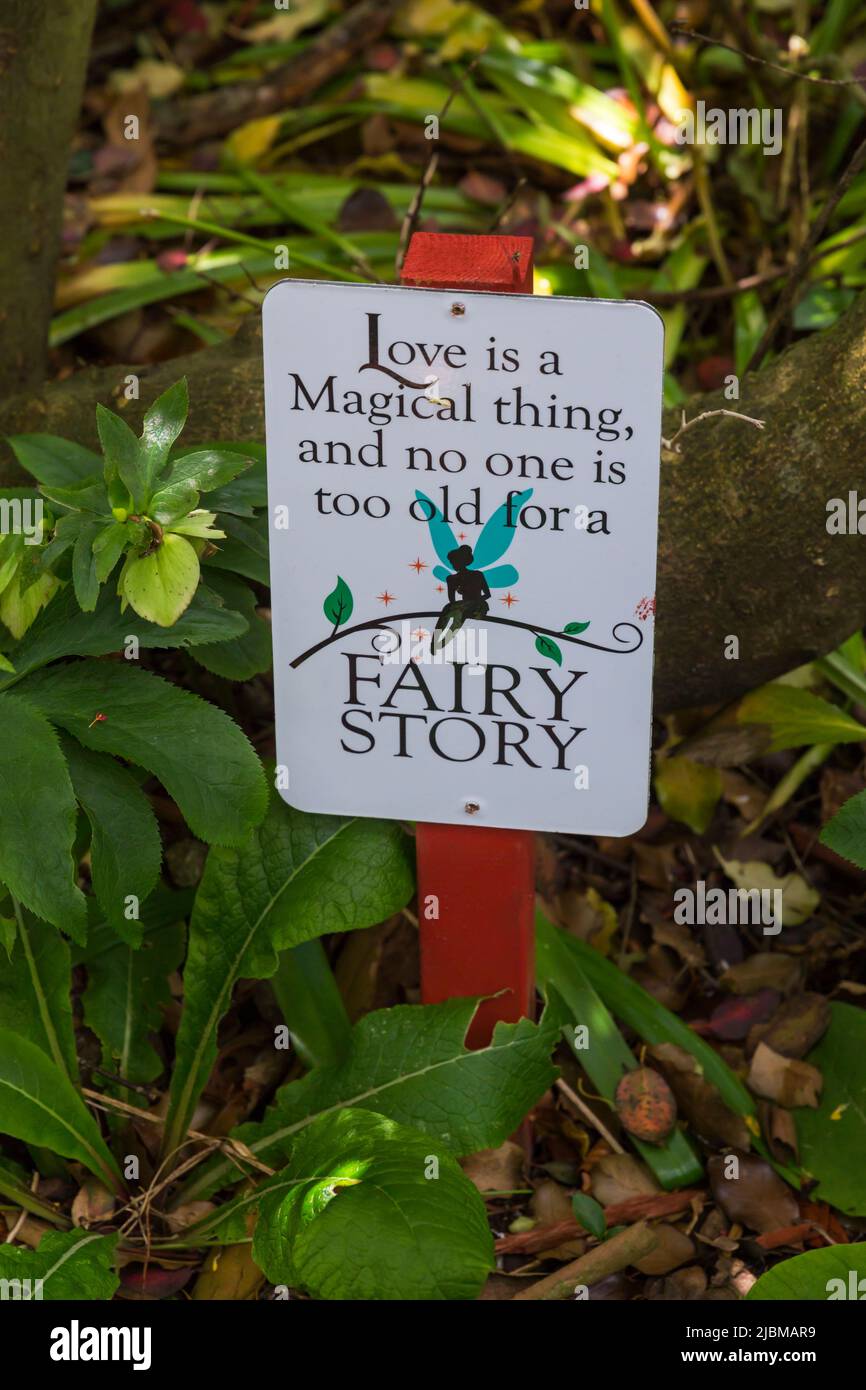 Love is a magical thing and no one is too old for a fairy story sign at Corfe Castle, Dorset UK in June Stock Photo