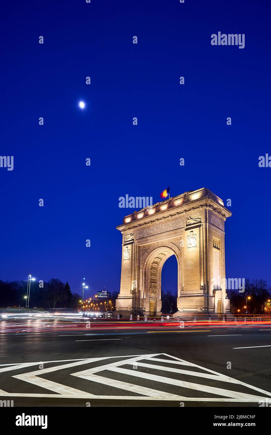 The Arcul De Triumf A Triumphial Arch In Bucharest Romania At Night 