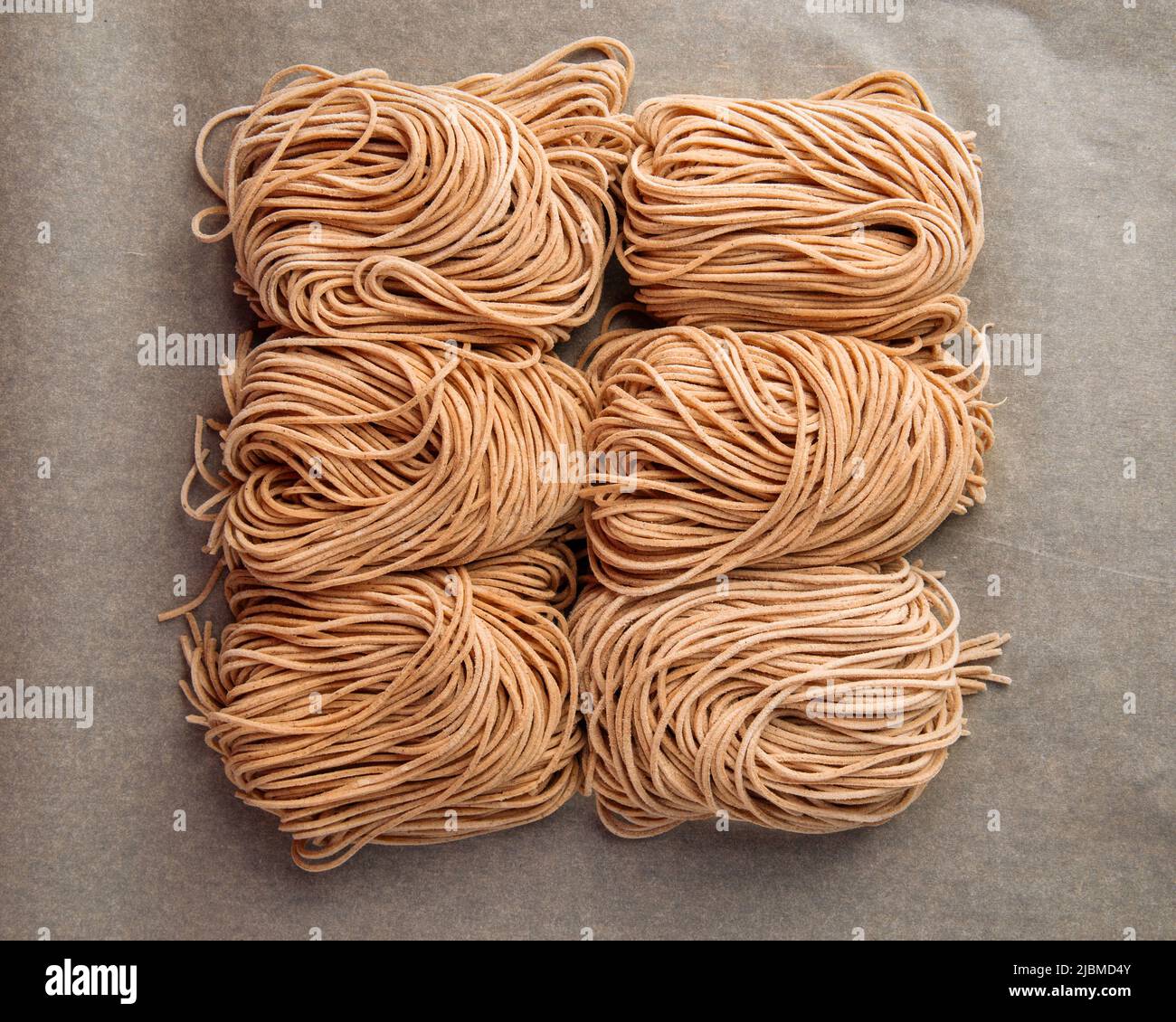 Raw handmade noodles Stock Photo Alamy