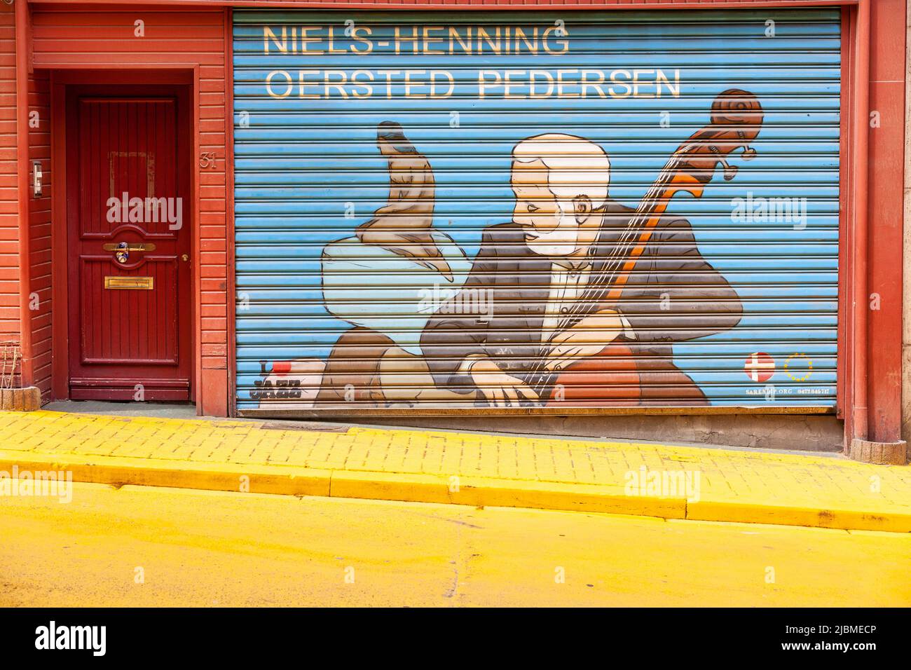 Pictorial representation, on a shutter, of double bass player Niels-Henning Pedersen with, in the background, the siren of Copenhagen, Stock Photo