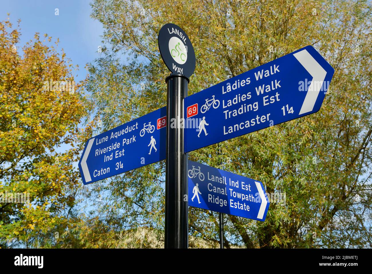 A signpost on the Lanais Way pointing to various cycle and walking routes in Lancaster city centre UK Stock Photo