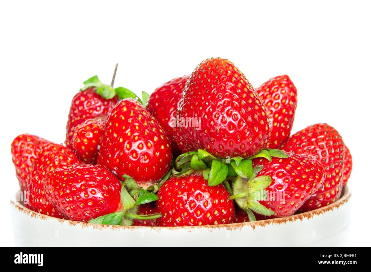 Pile of fresh red strawberries isolated on a white background Stock ...