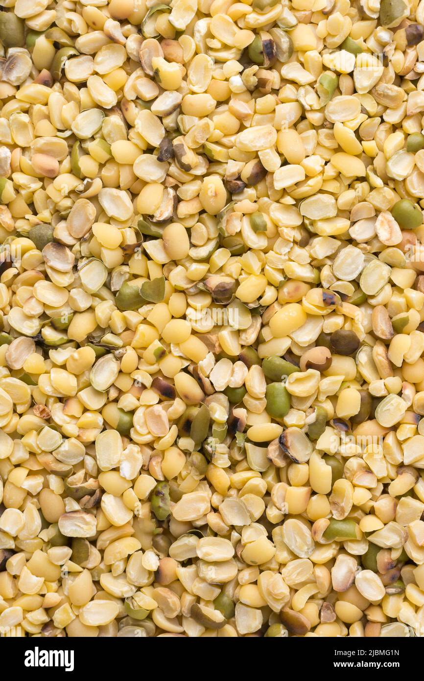 split skin removed mung beans or green grams, also known as moong seeds, staple ingredient in southeast asian dishes, protein rich legumes Stock Photo