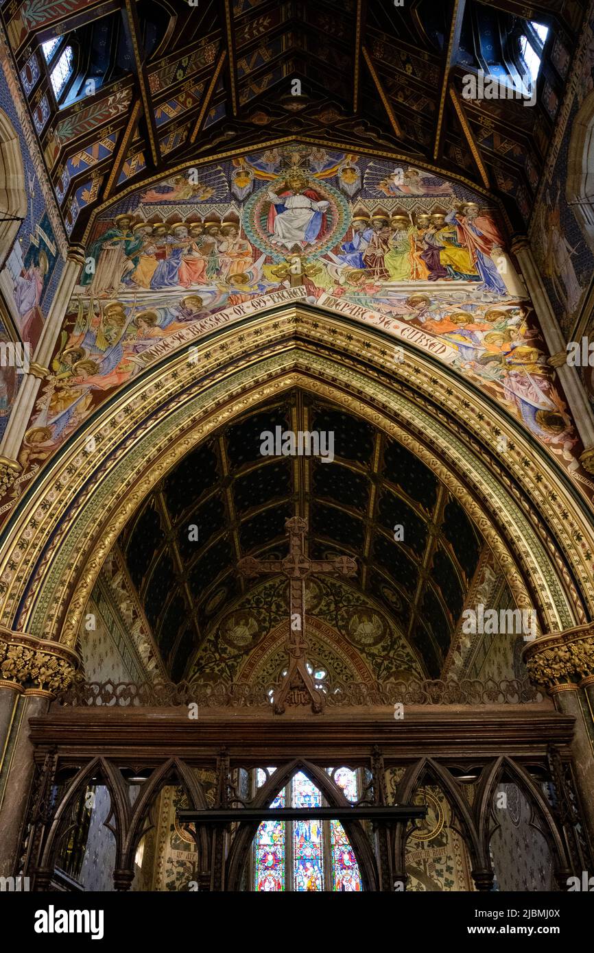 Holy Innocents Church, Highnam, Gloucestershire - interior, frescoes and stained glass Stock Photo