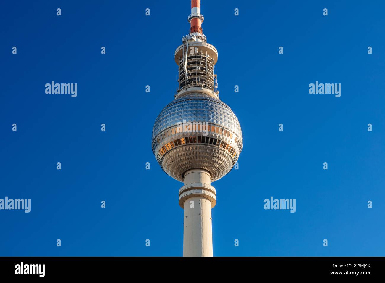 Close up of the Berlin Television Tower, Berliner Fernsehturm against a blue sky, Berlin, Germany Stock Photo
