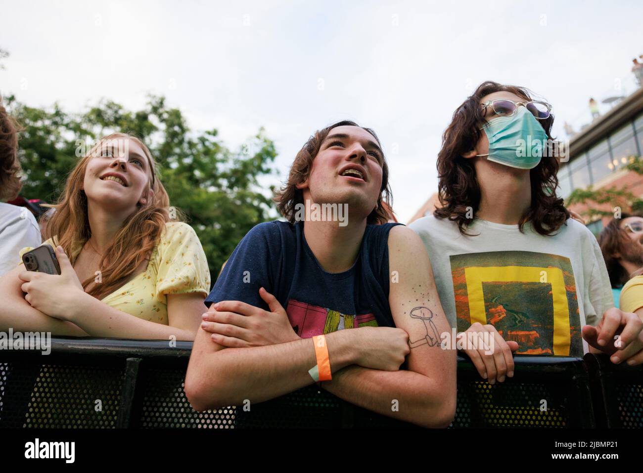BLOOMINGTON, INDIANA - JUNE 4: An audience watches Car Seat Headrest perform during the Granfalloon festival on June 4, 2022, in Bloomington, Indiana. ÒGranfalloon is an annual festival of arts, music, and scholarship inspired by Hoosier author Kurt Vonnegut,Ó according to the eventÕs webpage. The festival takes place in Bloomington, Indiana. Stock Photo