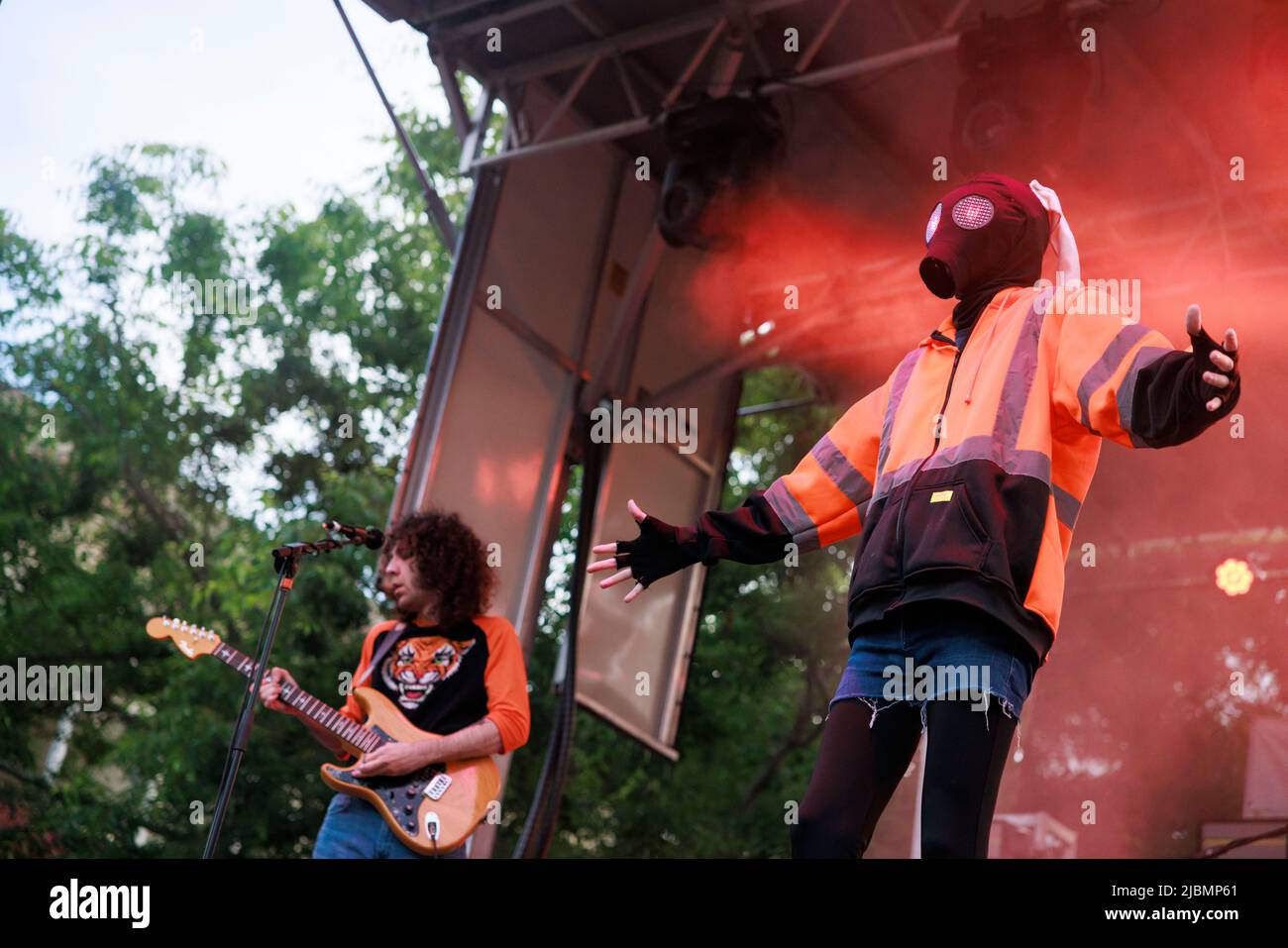 BLOOMINGTON, INDIANA - JUNE 4: Will Toledo of Car Seat Headrest, right, wears a mask, Ethan Ives plays guitar, while performing during the Granfalloon festival on June 4, 2022, in Bloomington, Indiana. ÒGranfalloon is an annual festival of arts, music, and scholarship inspired by Hoosier author Kurt Vonnegut,Ó according to the eventÕs webpage. The festival takes place in Bloomington, Indiana. Stock Photo