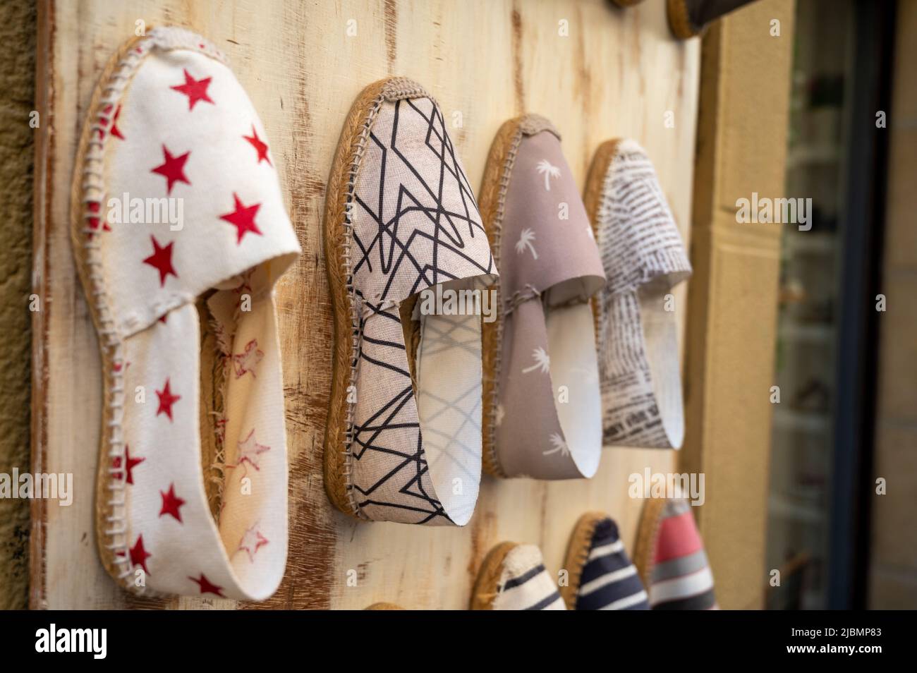 Traditional Spanish shoes for summer, espadrilles, make from soft fabric  for baby, children and adults, close up Stock Photo - Alamy