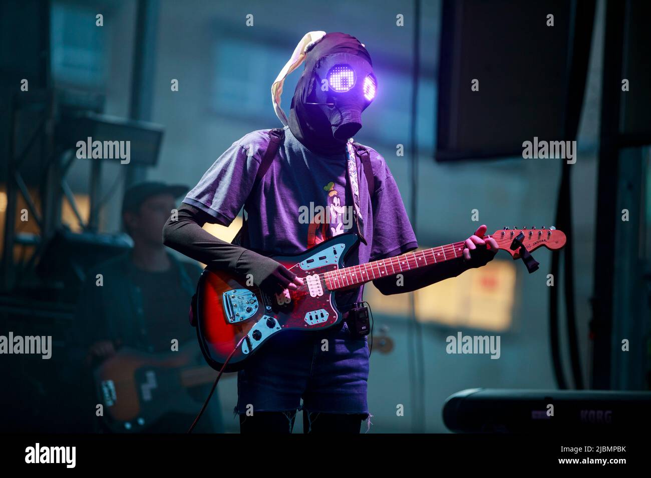 BLOOMINGTON, INDIANA - JUNE 4: Will Toledo of Car Seat Headrest wears a mask while performing during the Granfalloon festival on June 4, 2022, in Bloomington, Indiana. ÒGranfalloon is an annual festival of arts, music, and scholarship inspired by Hoosier author Kurt Vonnegut,Ó according to the eventÕs webpage. The festival takes place in Bloomington, Indiana. Stock Photo