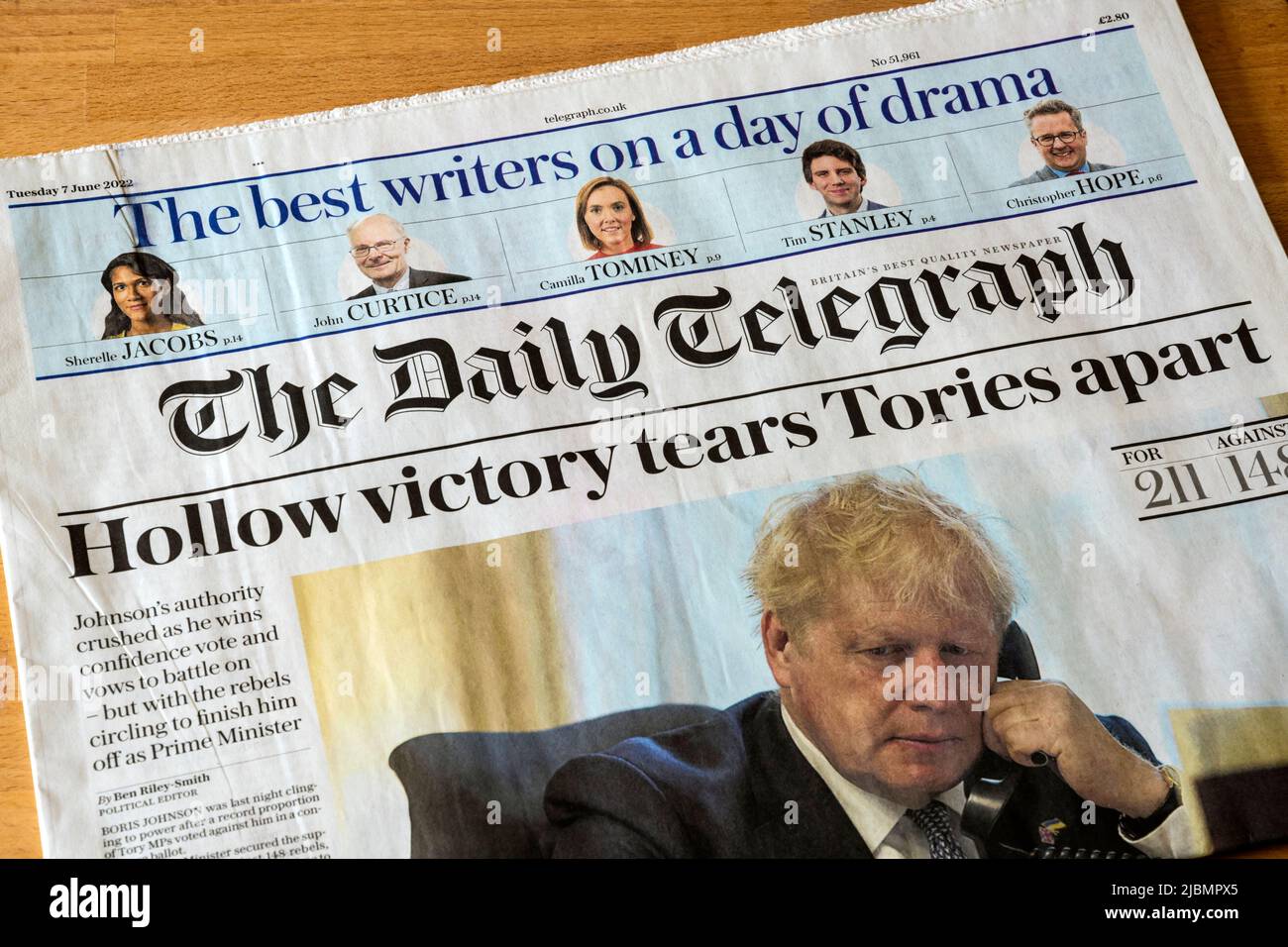 7 June 2022. The Daily Telegraph newspaper headline reads Hollow victory tears Tories apart, after Boris Johnson survives a vote of no confidence. Stock Photo