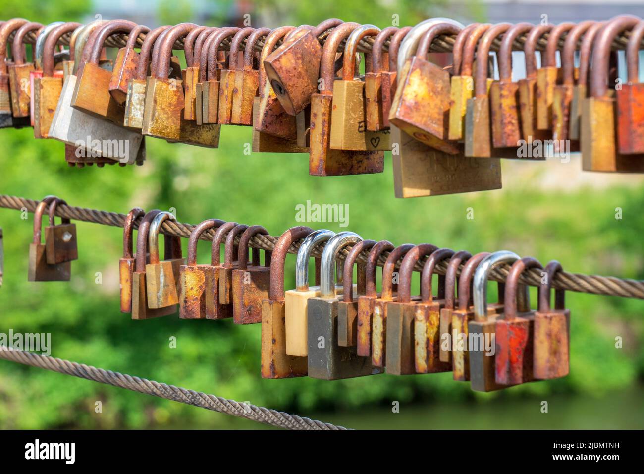 love locks hanging on a bridge Stock Photo