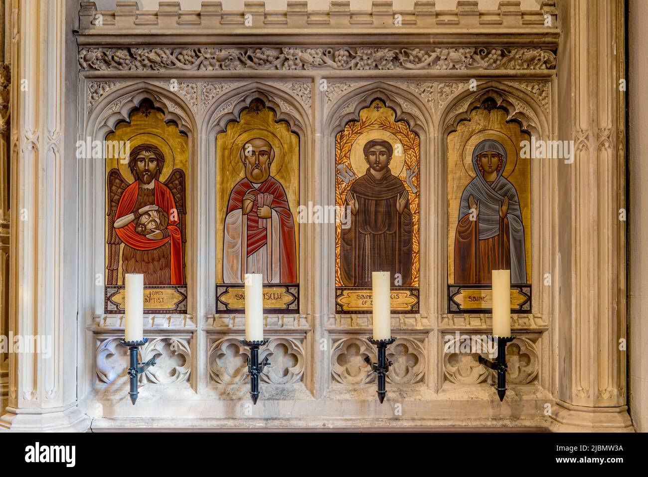 The painted icons to the right of the altar at Launde Abbey chapel including St John the Baptist Stock Photo