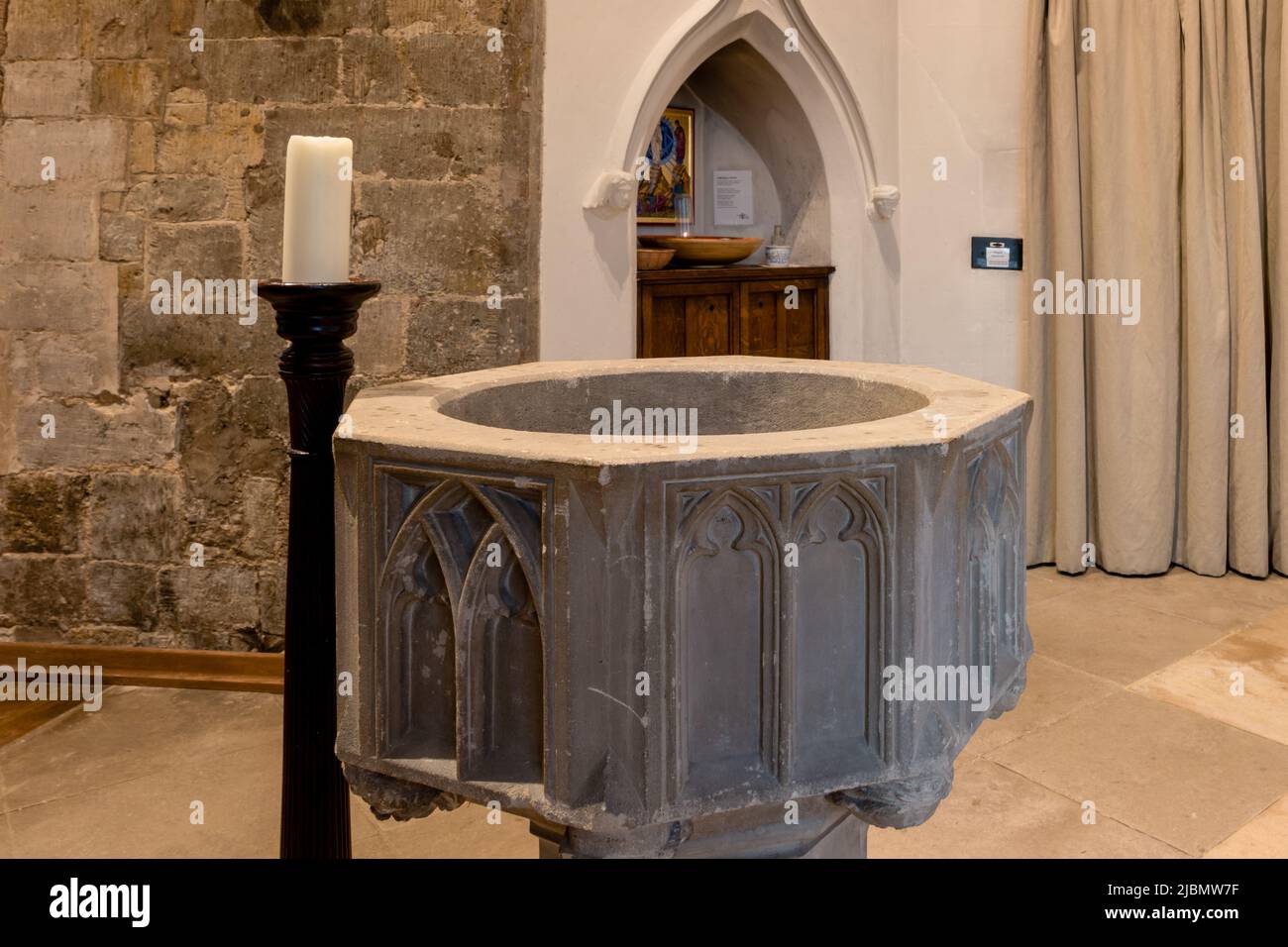 Stone baptismal font in the Chapel of Saint John the Baptist at Launde Abbey Stock Photo