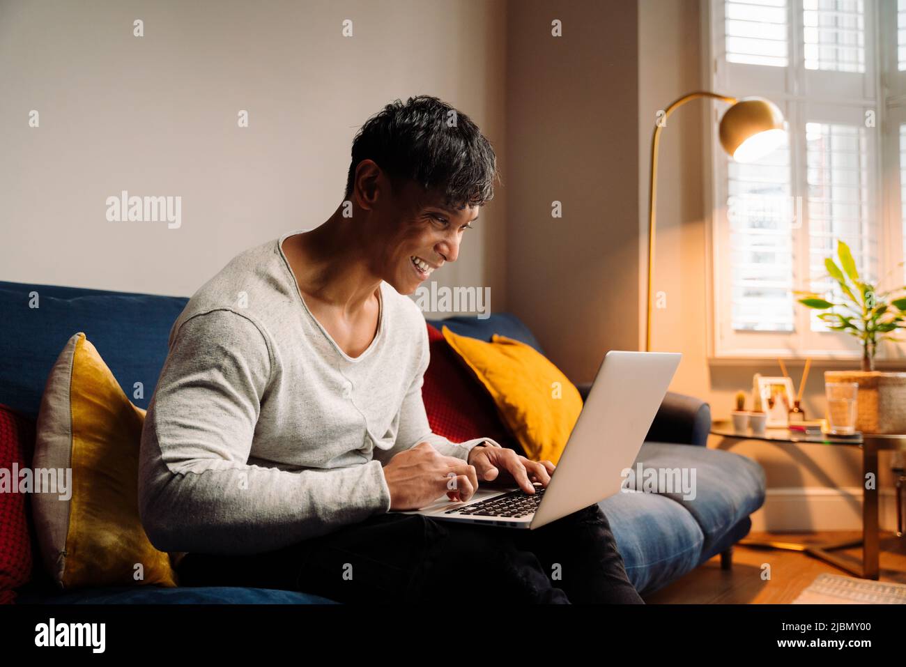 Young Asian man working online Stock Photo