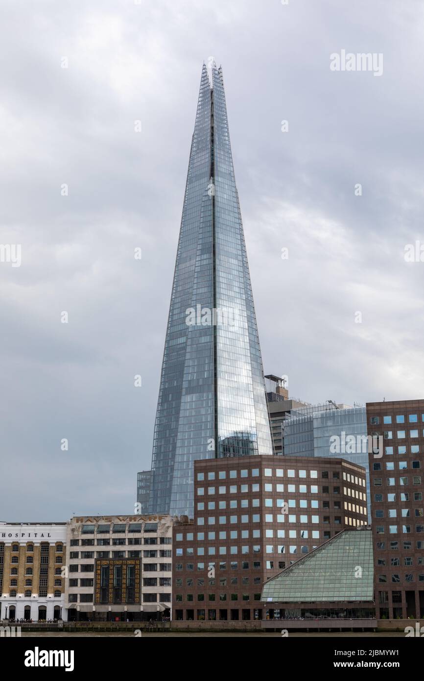 The Shard the new iconic building on the London skyline. Tallest building set against a dramatic sky Stock Photo