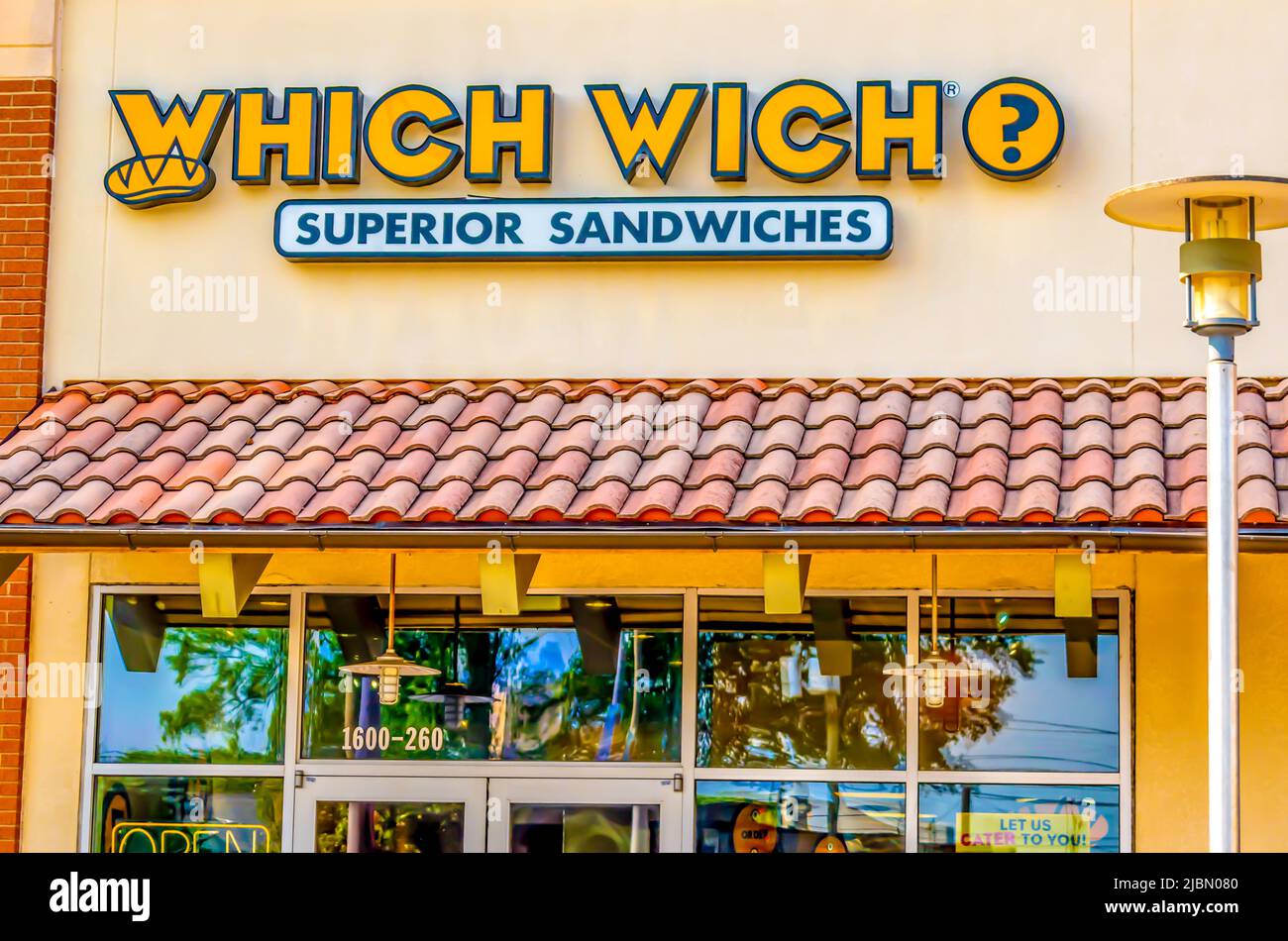 Charlotte, NC/USA - May 22, 2019:  Horizontal medium closeup of 'Which Wich Superior Sandwiches' sandwich shop showing brand and logo in Charlotte. Stock Photo