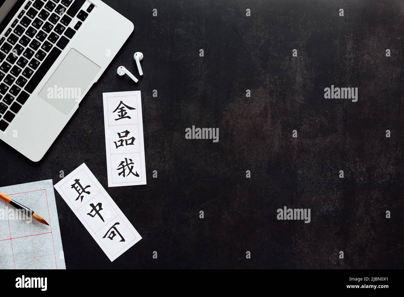 Chinese Course Background Flat lay mockup for online courses of Chinese language. Laptop and ...