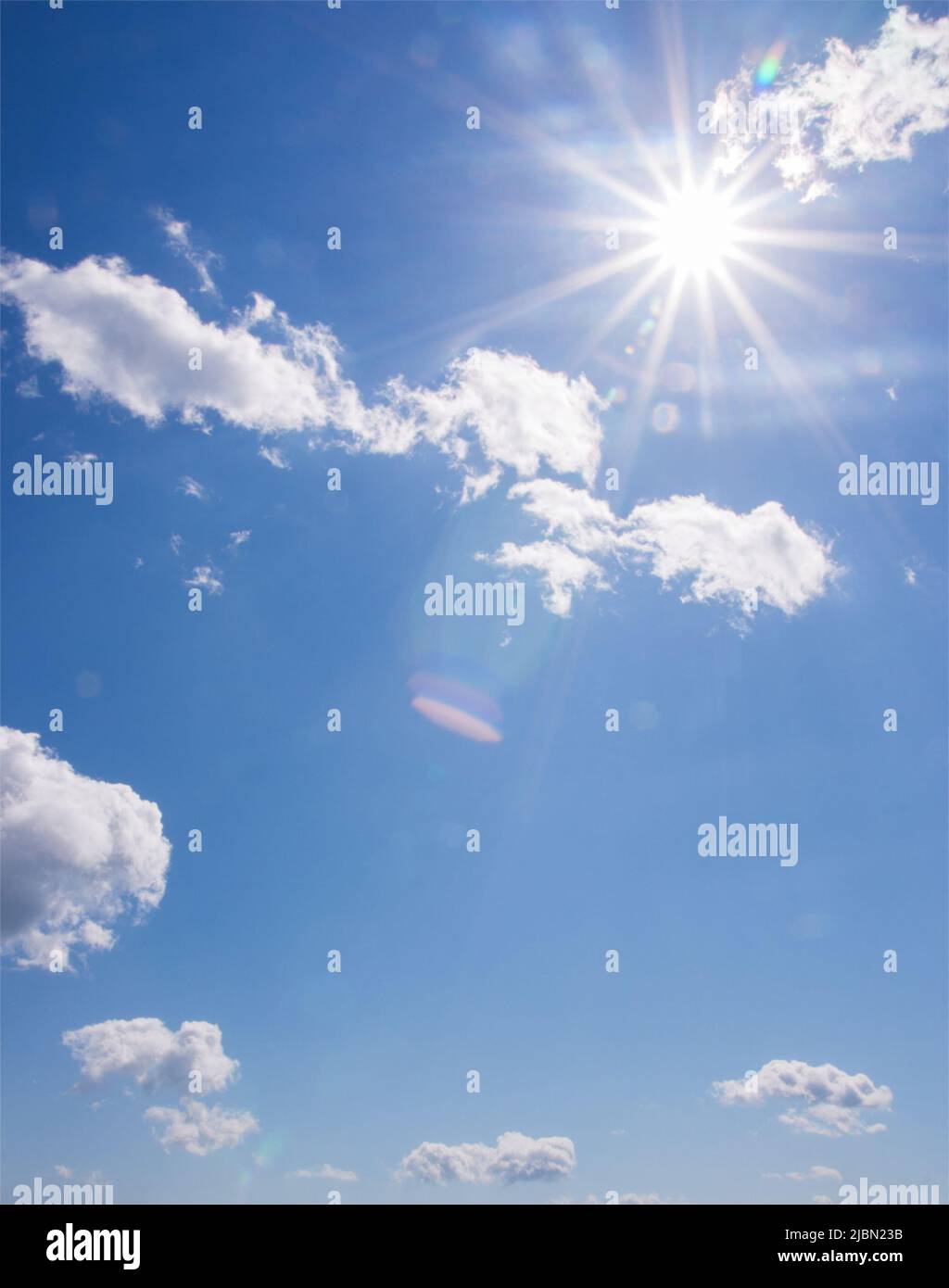 Beautiful sky. Blue sky with sun and clouds in sunshine Stock Photo Alamy