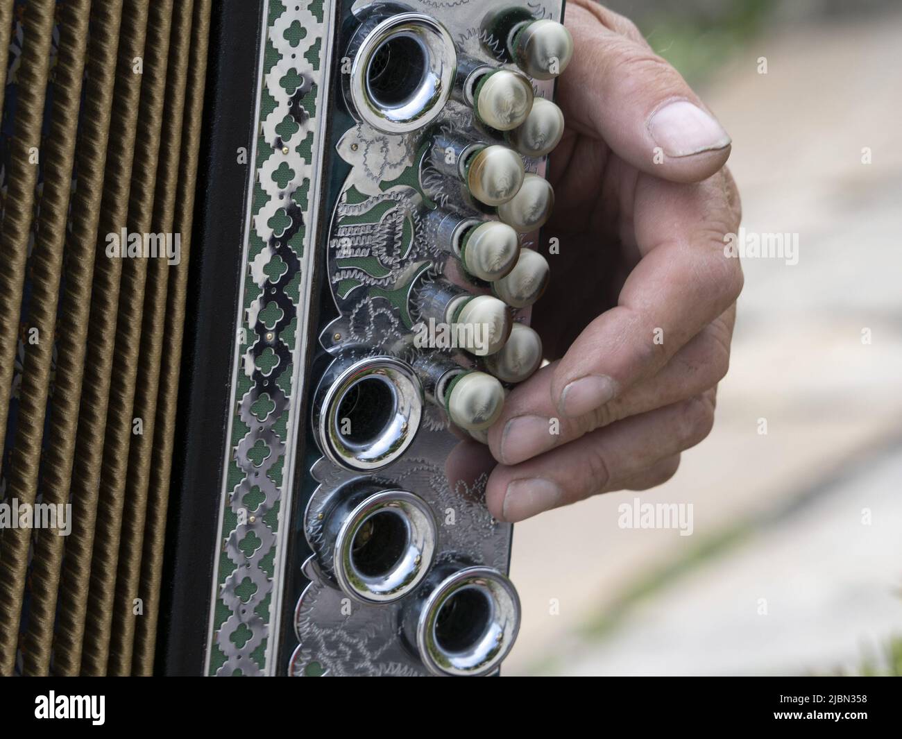 Hands playing accordion detail close up Stock Photo Alamy