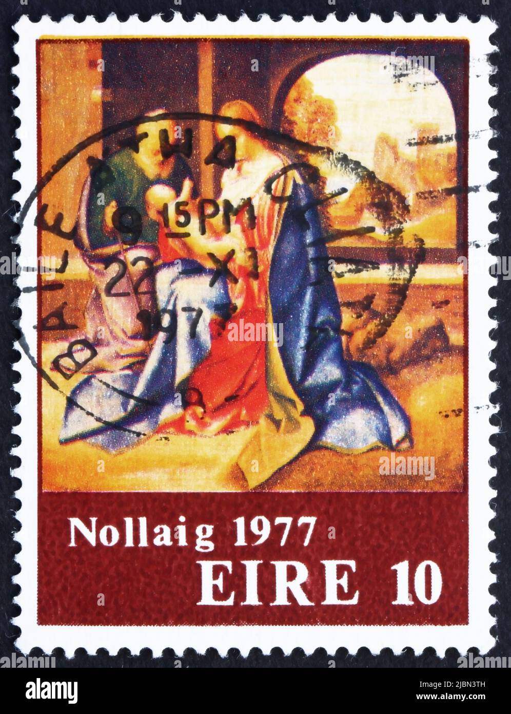 IRELAND - CIRCA 1977: a stamp printed in the Ireland shows Holy Family, Painting by Giorgione, Christmas, circa 1977 Stock Photo