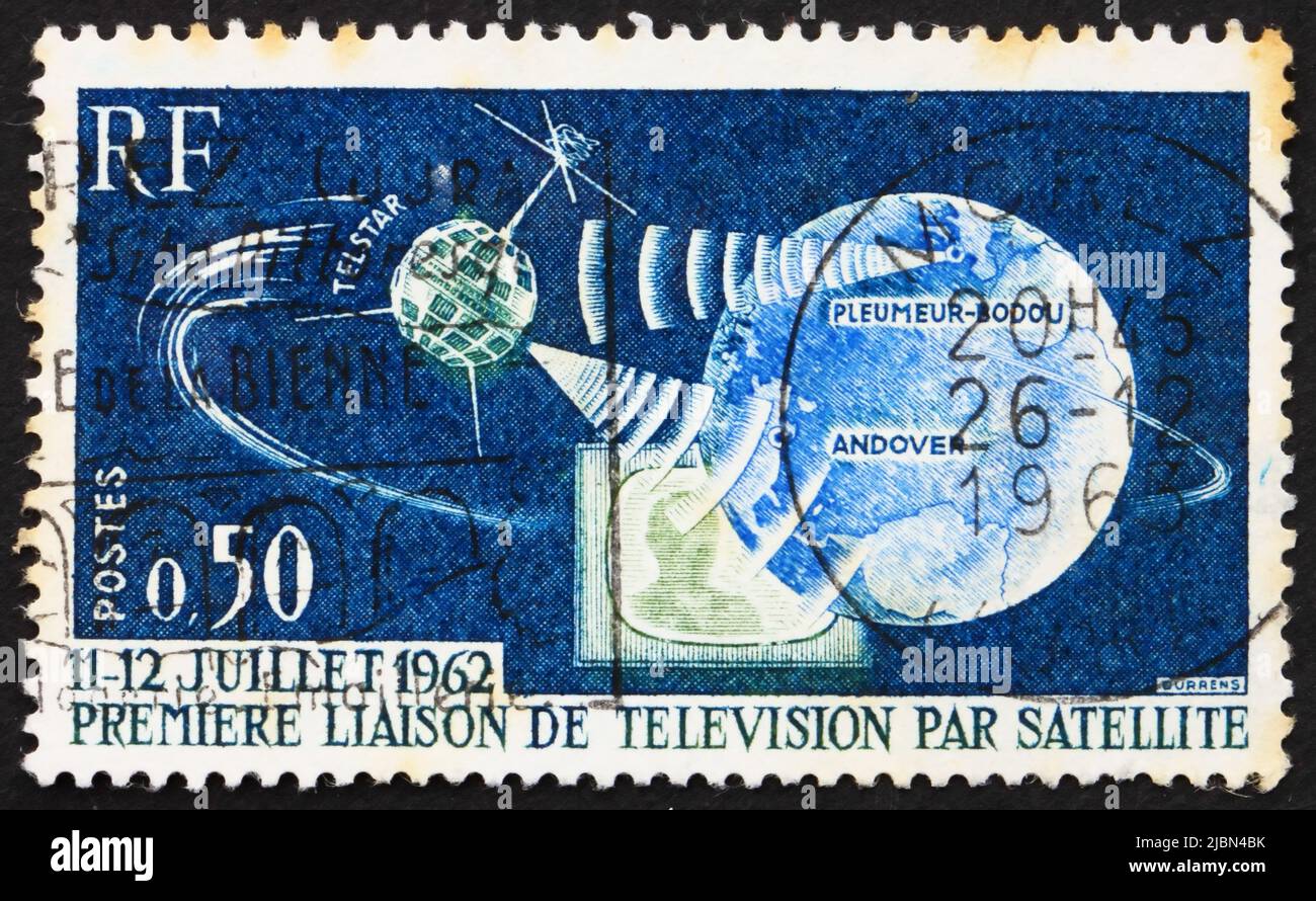 FRANCE - CIRCA 1962: a stamp printed in the France shows Telstar, Earth and Television, 1st Television Connection of the US and Europe through Telstar Stock Photo