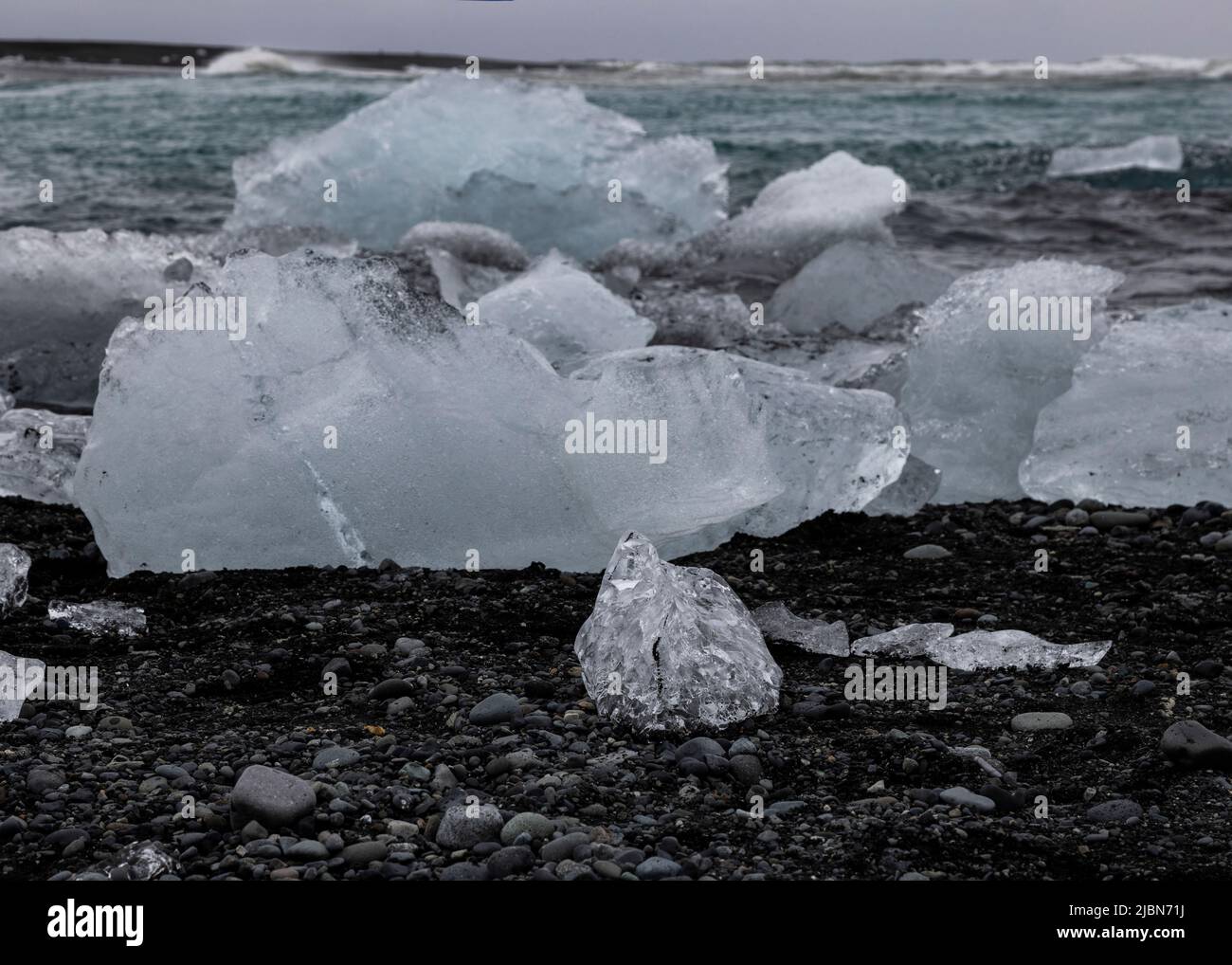The remains of ice floes on the shoreline at Diamond Beach Iceland Stock Photo
